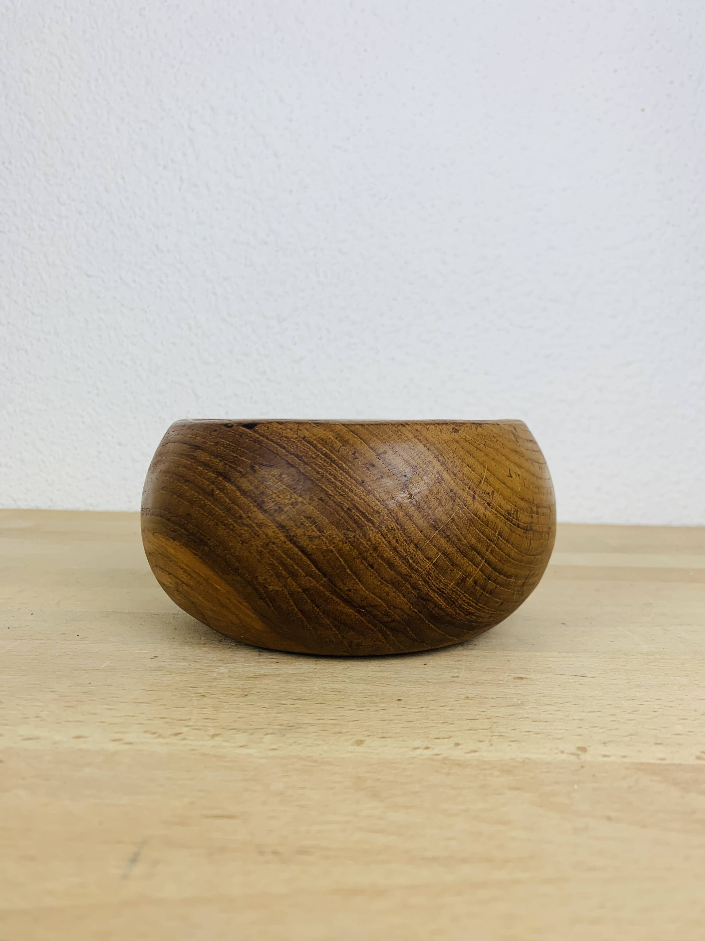 Scandinavian teak pocket emptier from the 60s