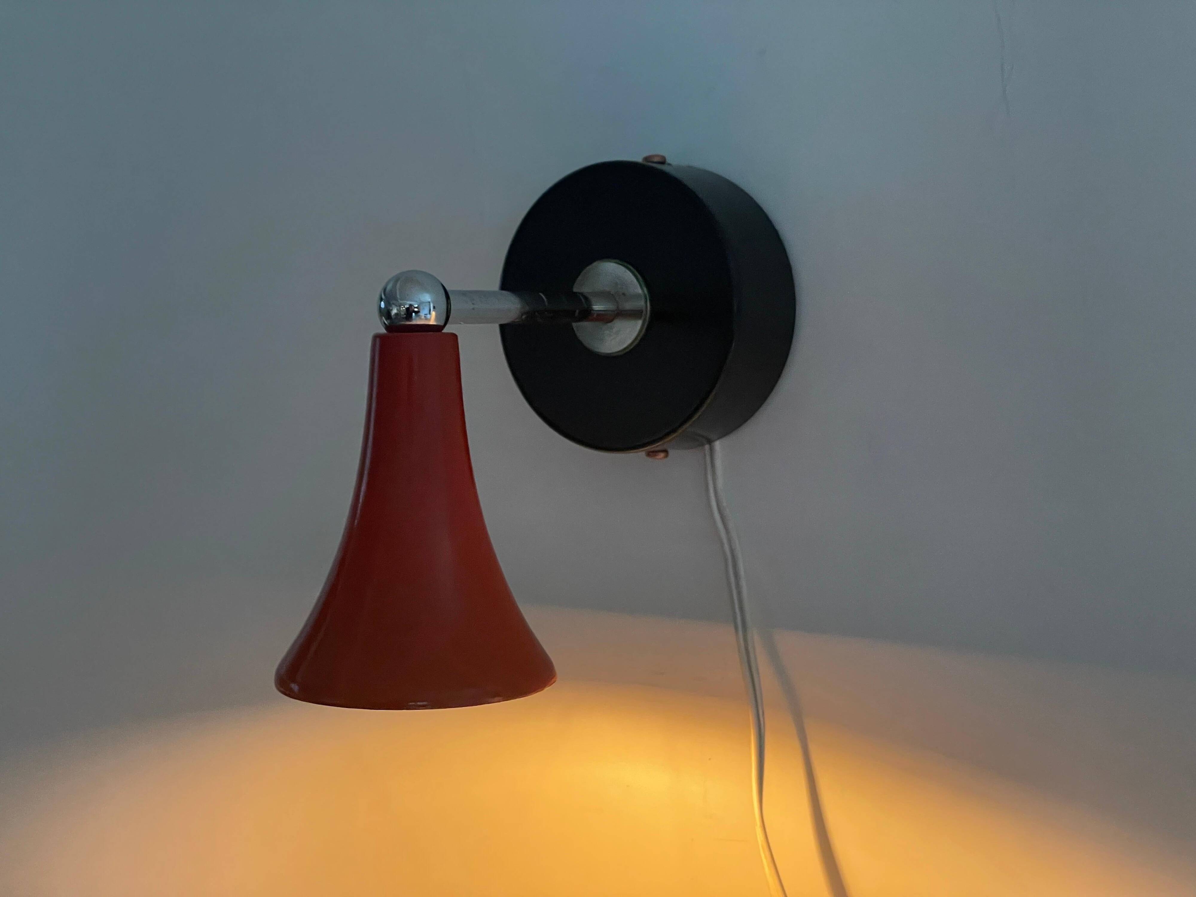 Pair of red metal wall lights AGE, 1970s, Italy