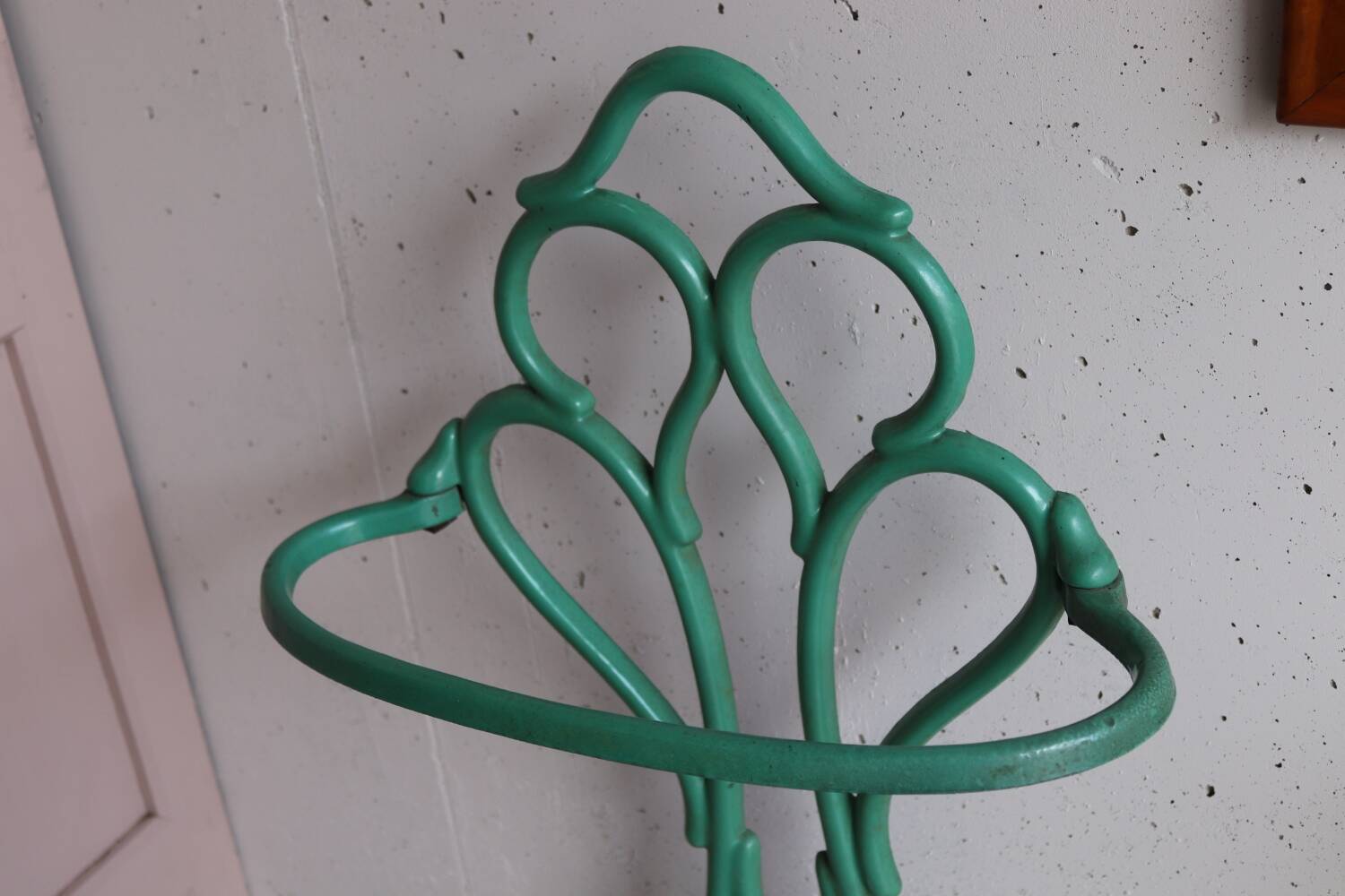 Old green cast iron umbrella stand