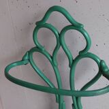 Old green cast iron umbrella stand