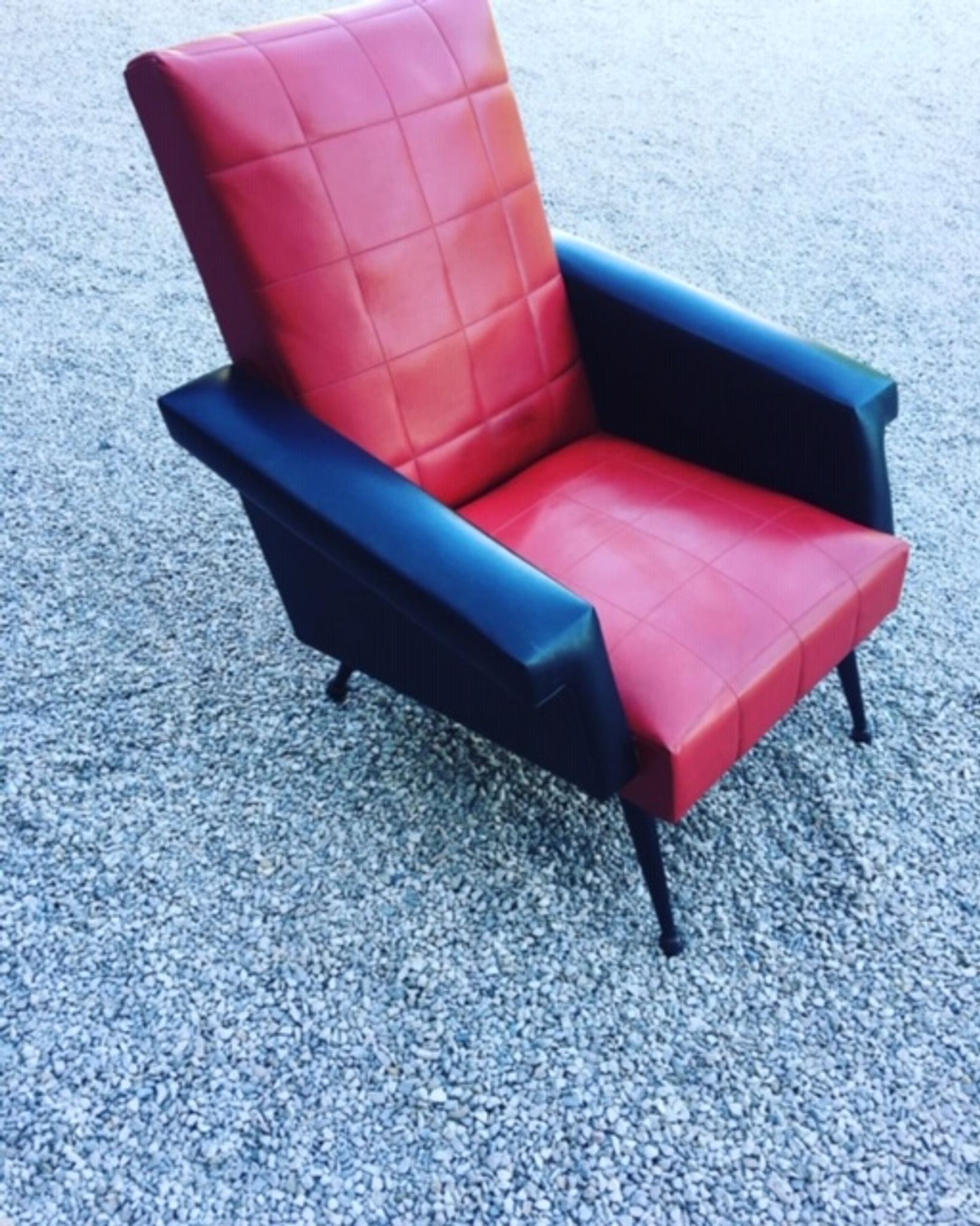 Vintage armchair in red and black skaï from the 1960s