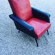 Vintage armchair in red and black skaï from the 1960s
