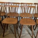Set of 8 vintage chairs with bars and compass legs 1960