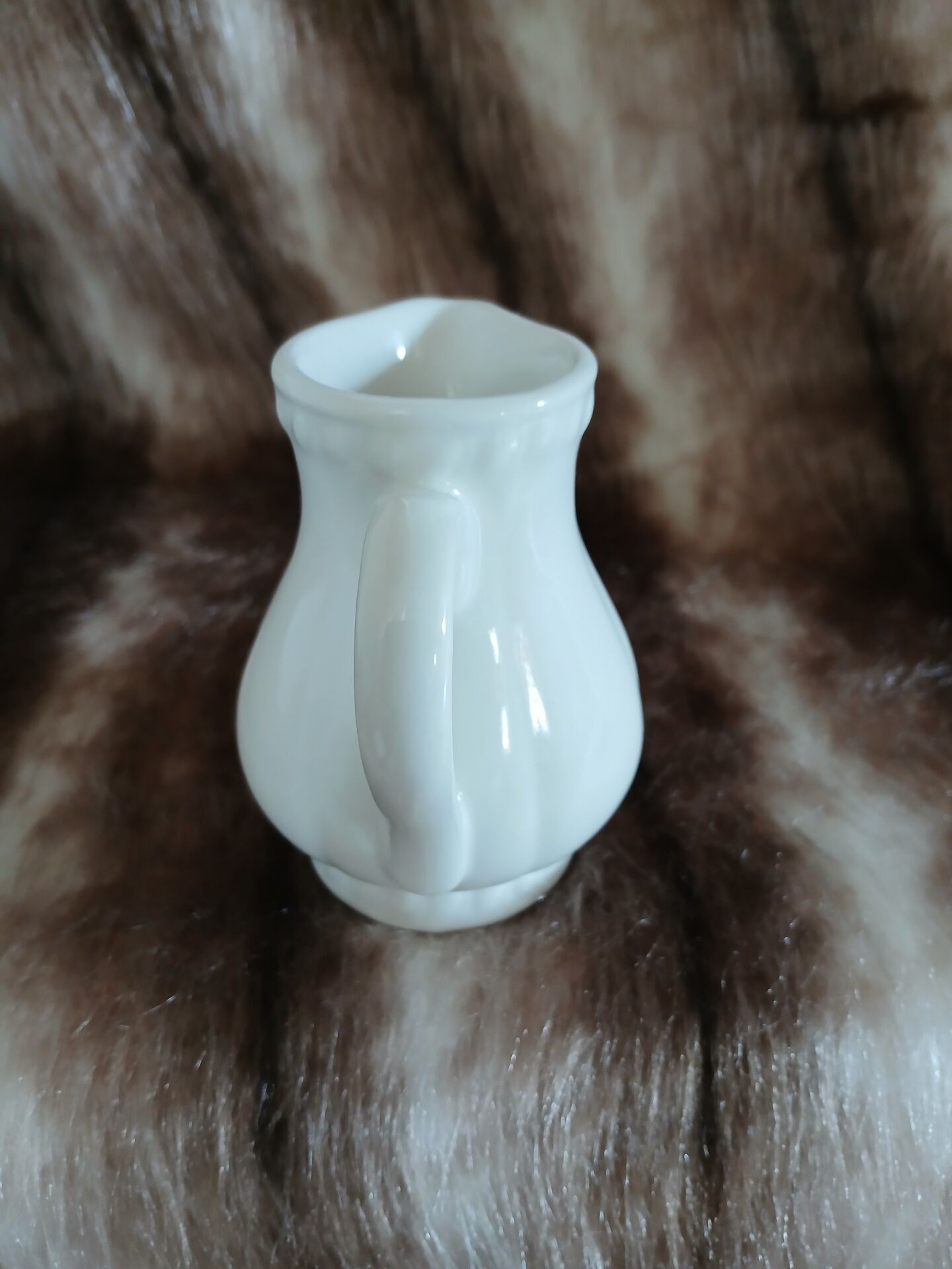 2 antique pitchers in white earthenware