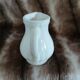 2 antique pitchers in white earthenware