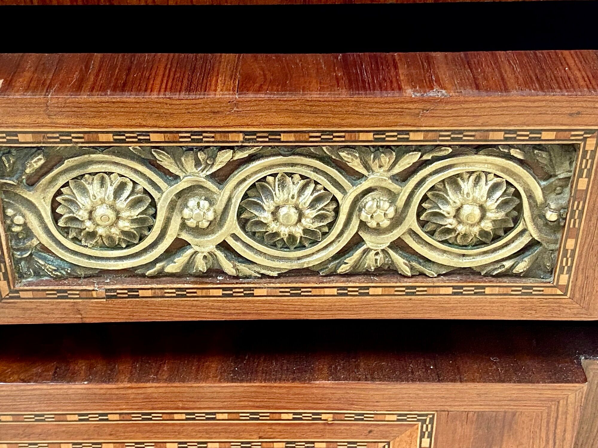 Transition chest of drawers with floral marquetry and music trophy