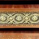 Transition chest of drawers with floral marquetry and music trophy