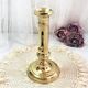 Gilded copper push candle holder