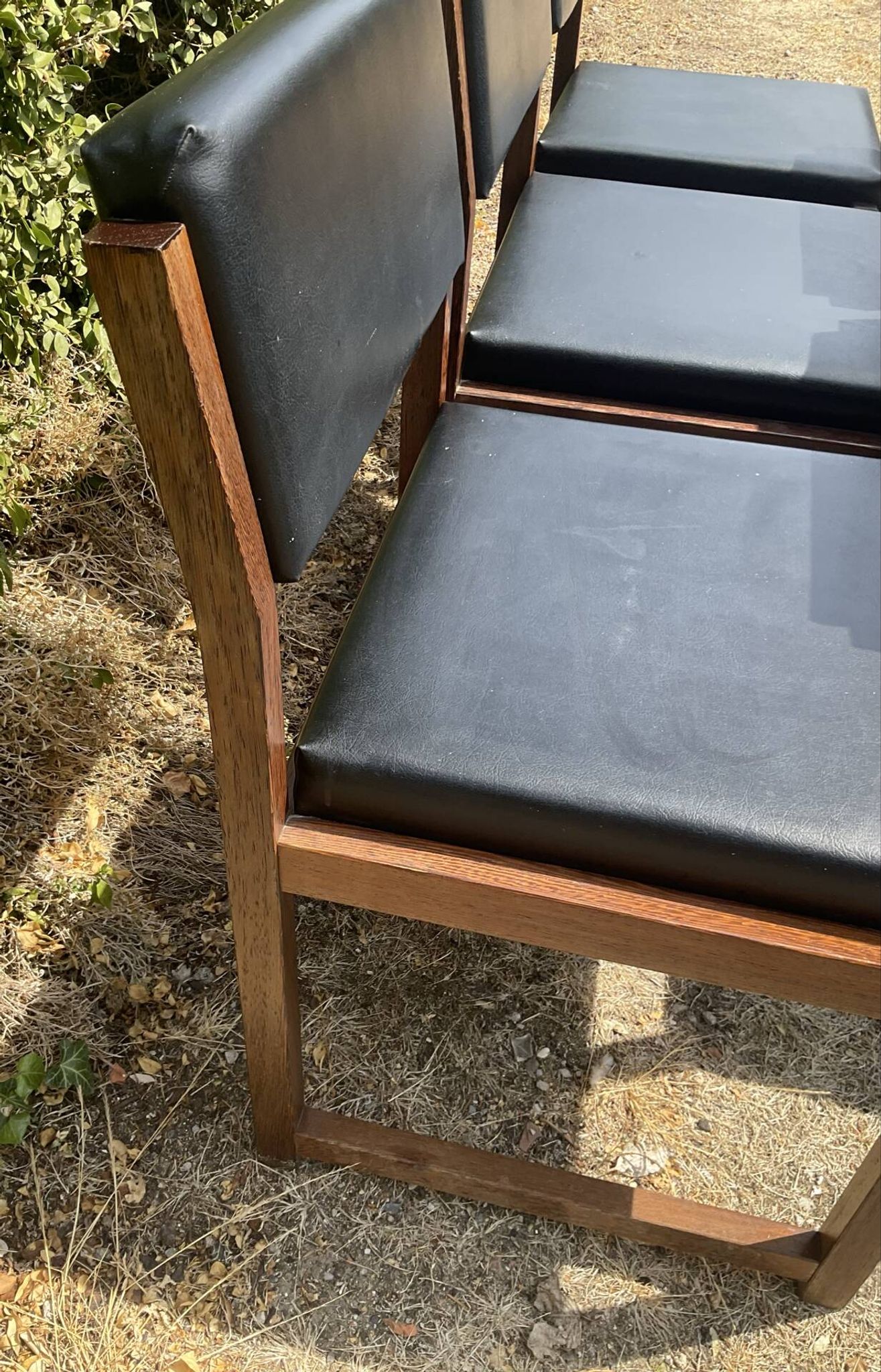 Set of 6 vintage teak chairs with black Skaï.