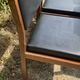 Set of 6 vintage teak chairs with black Skaï.