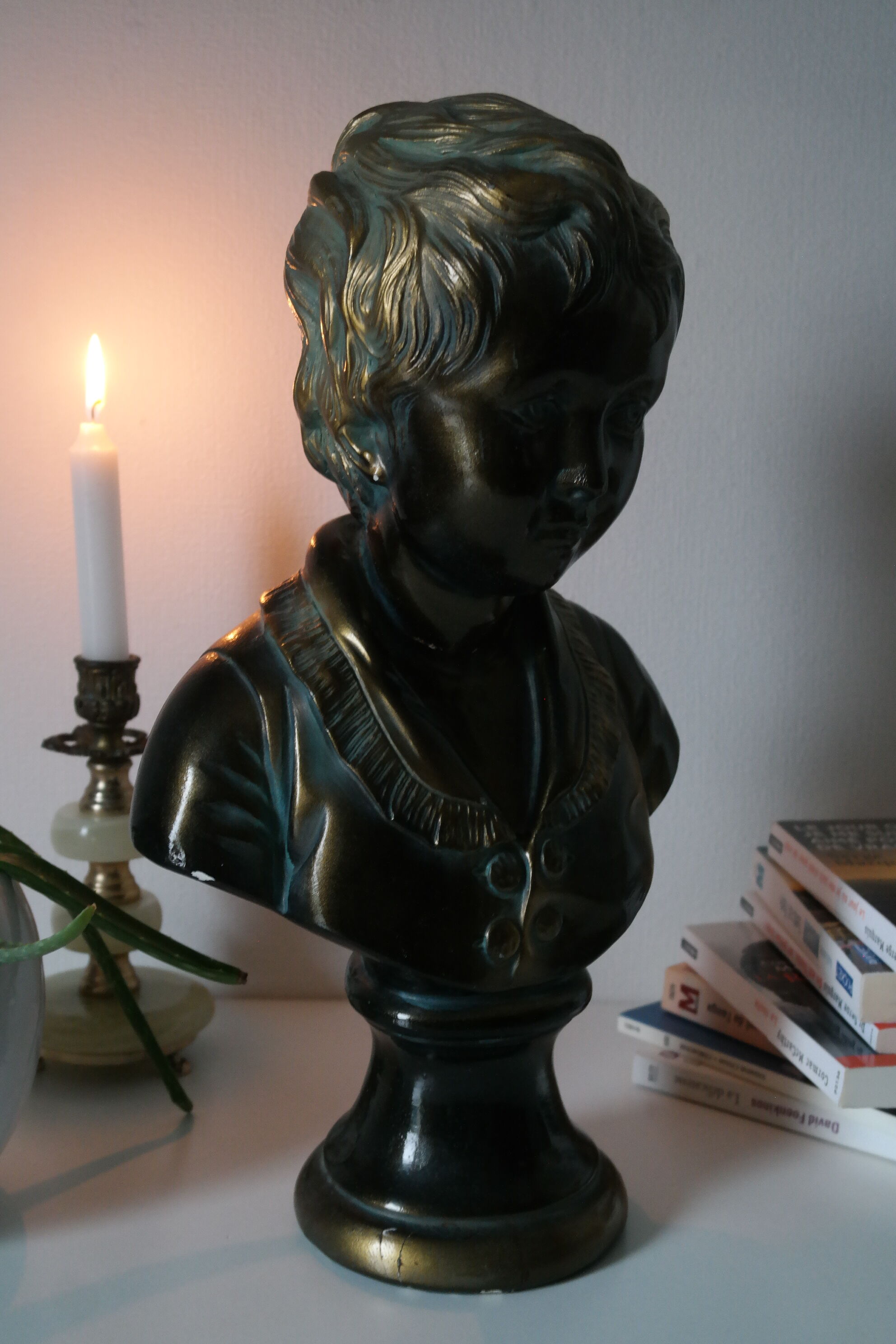 Buste en plâtre garçon patine bronze XXème