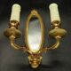 Paire d'appliques-miroirs style Louis XVI - bronze