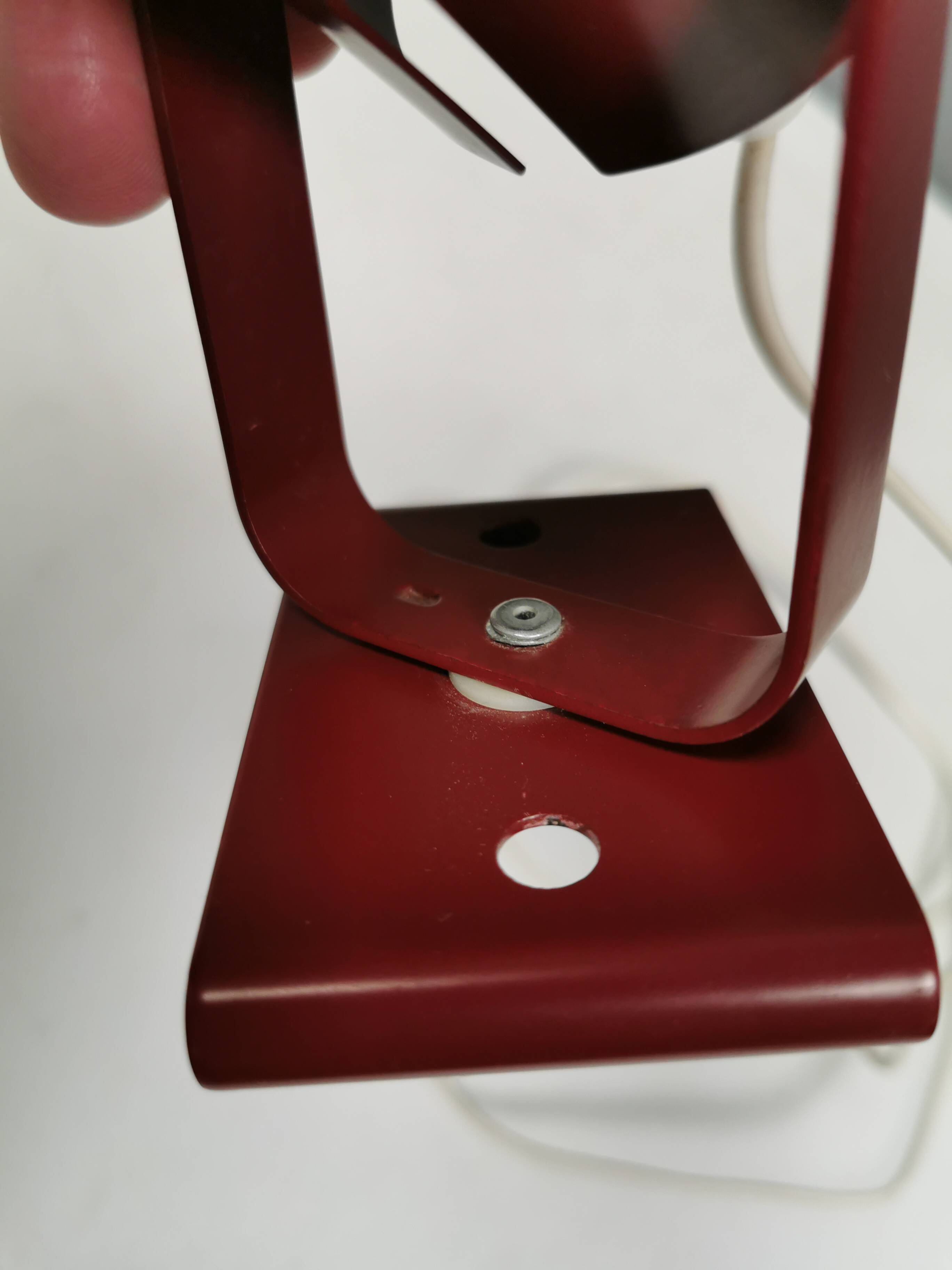 Small delicious wall lamp in Bordeaux red color from the 1980s