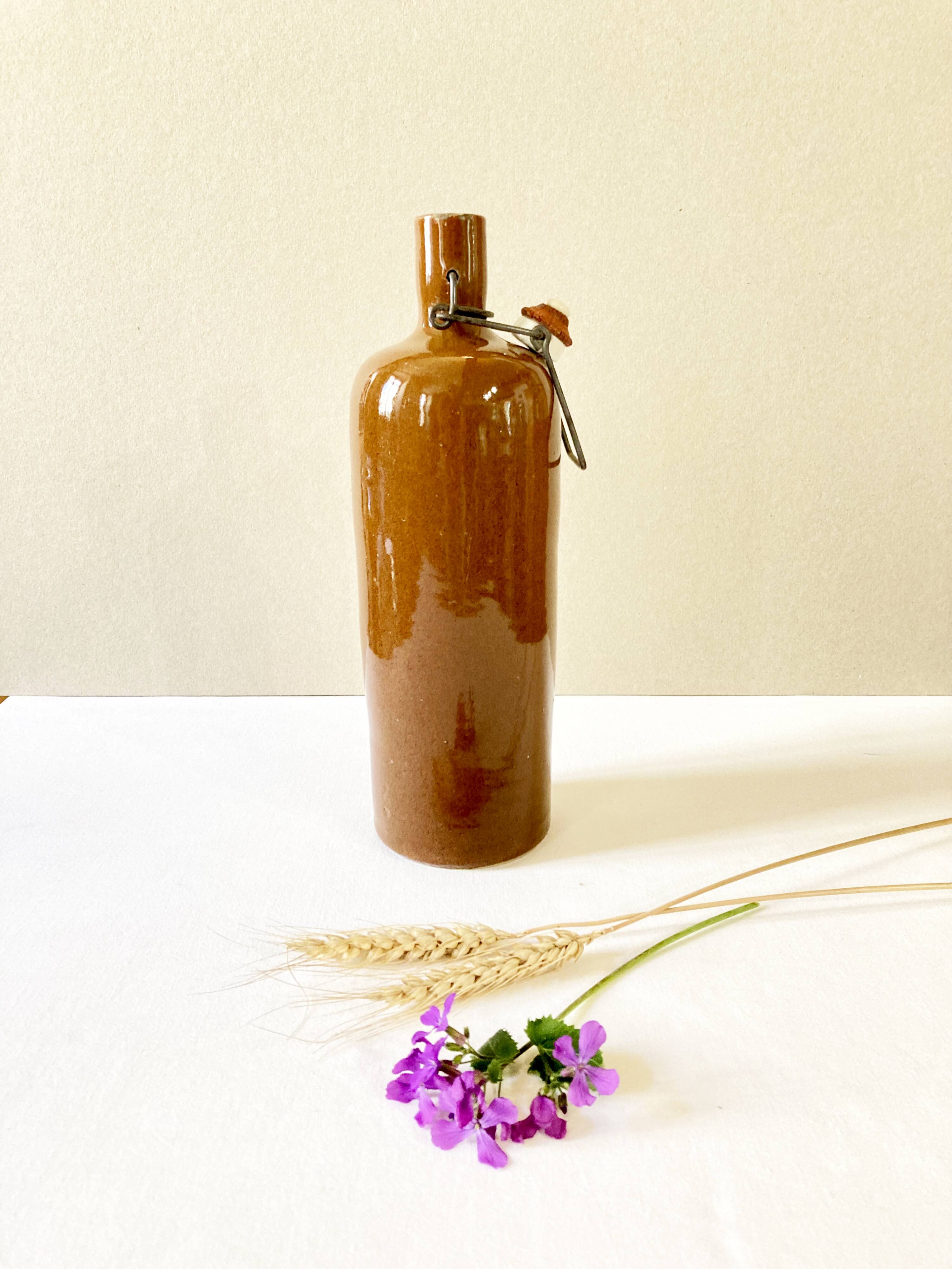 Bottle / hot water bottle in brown enamelled stoneware