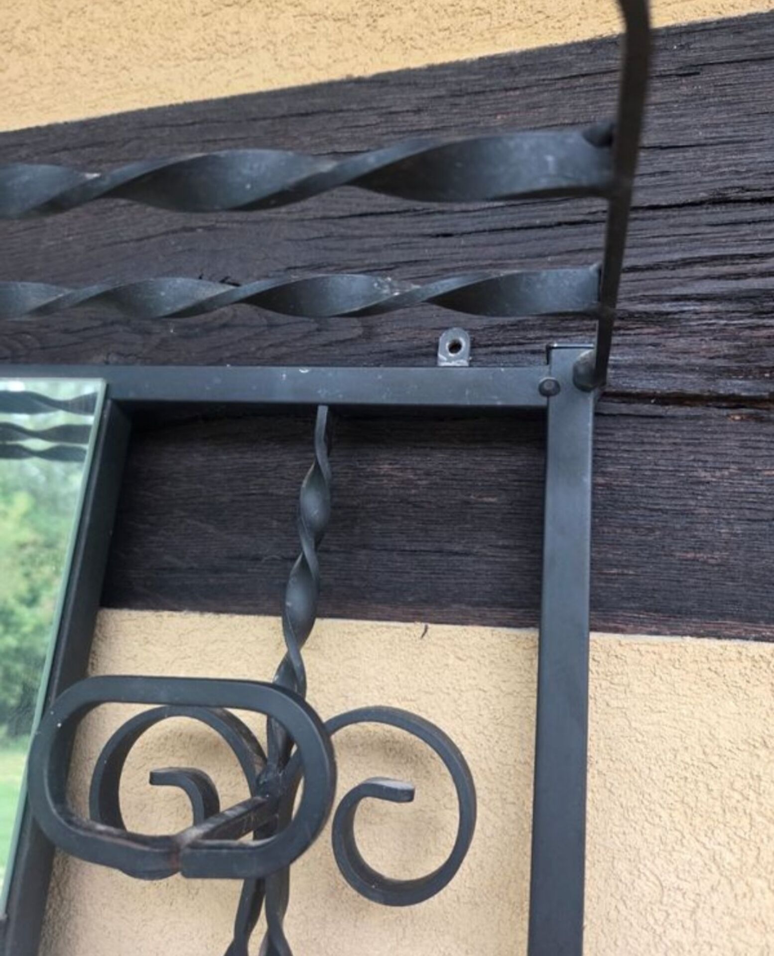 Large vintage wall coat rack in wrought iron with mirror and shelf.