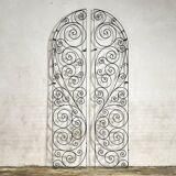 Arched wrought iron gate