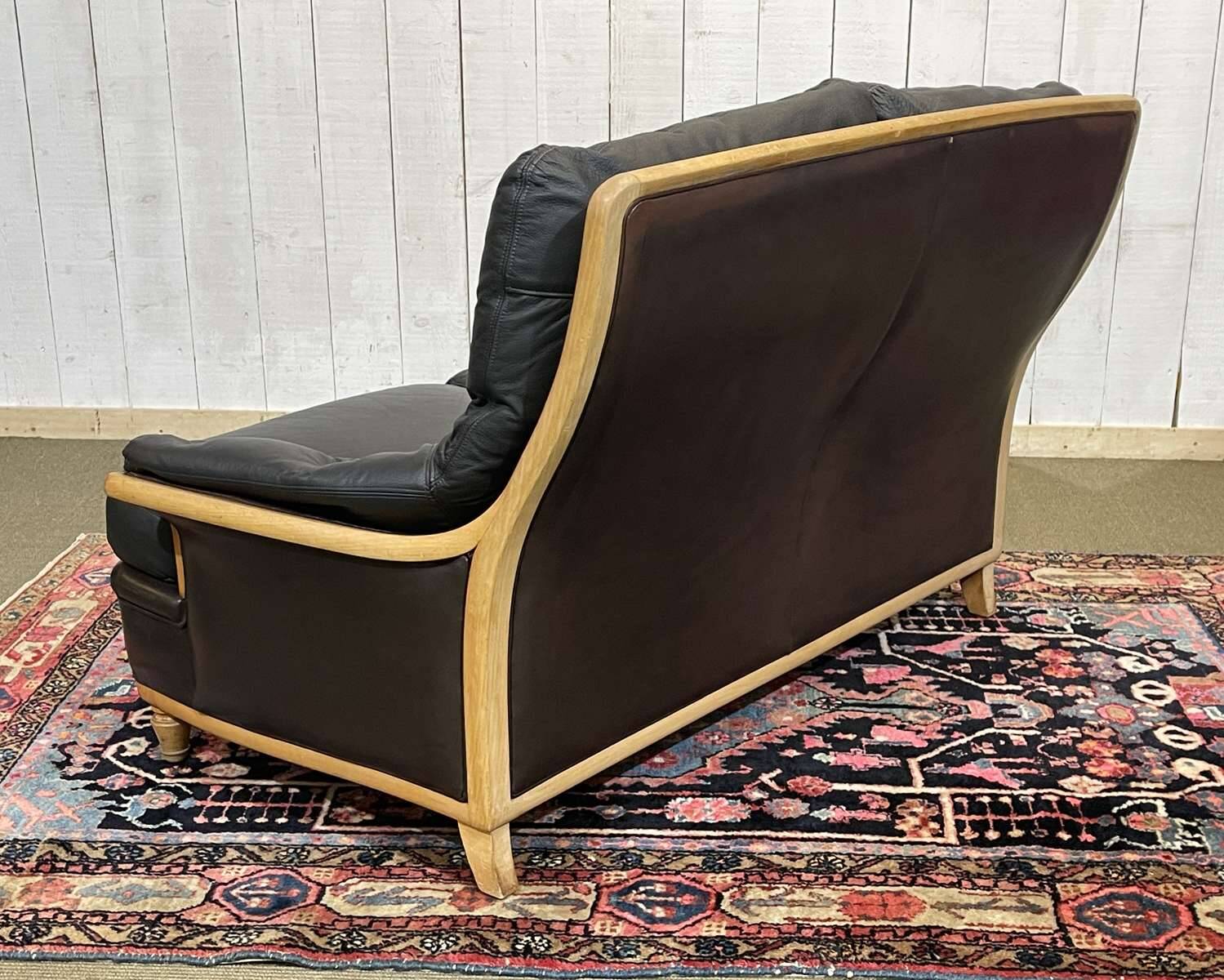 Leather and beech canapé from the 1970s.