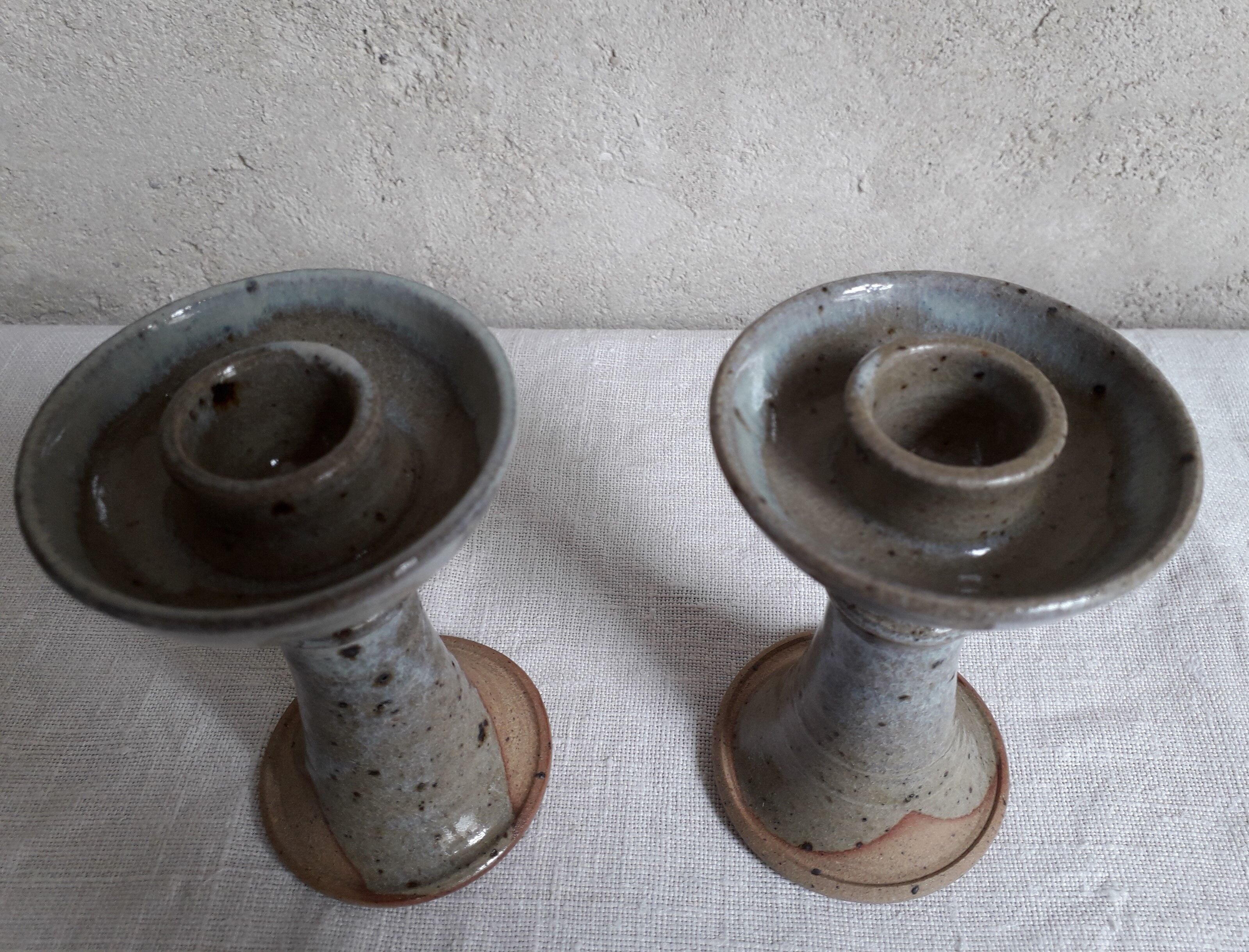 Pair of sandstone candlesticks