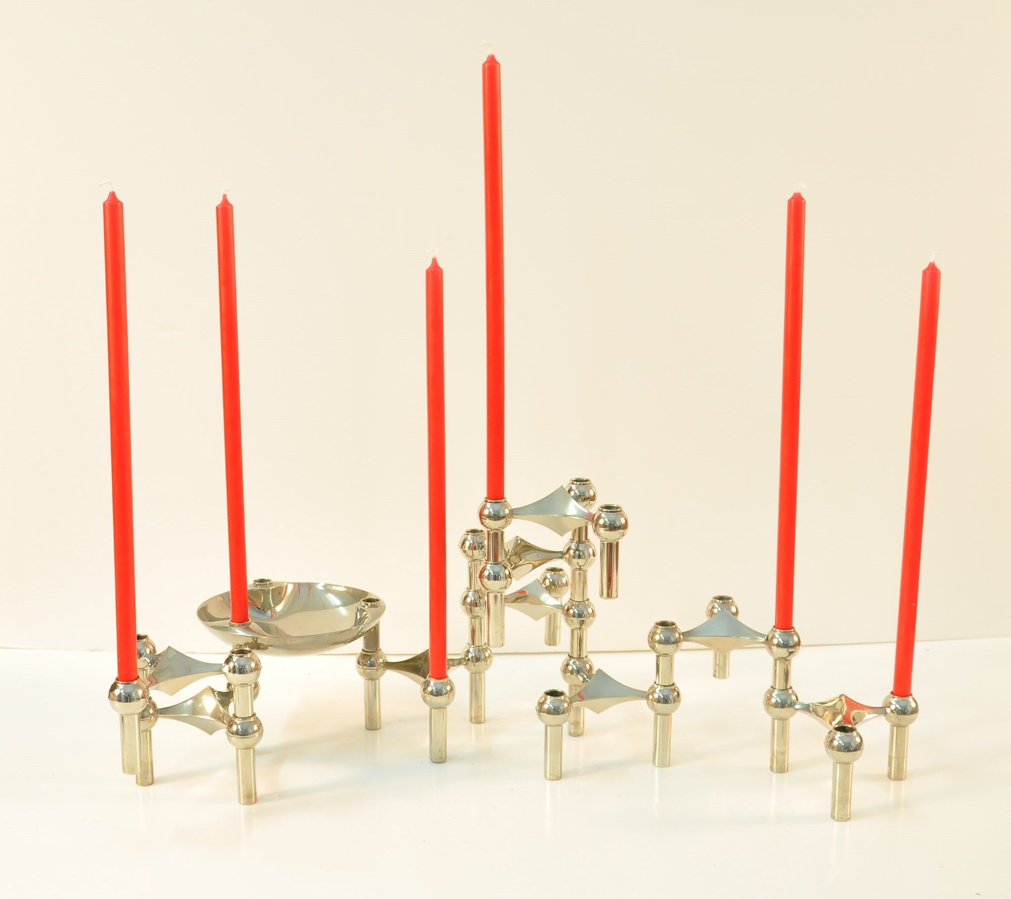 9 candlesticks and a Nagel Cup