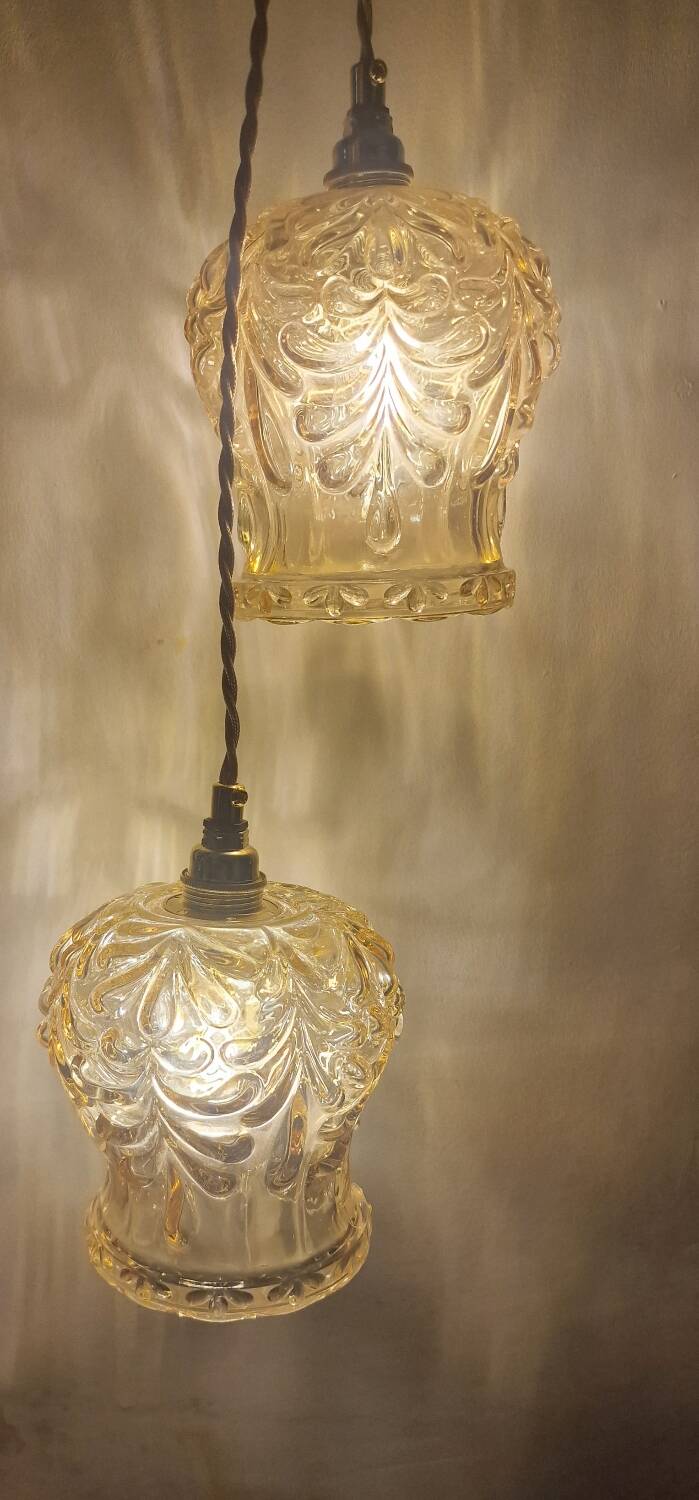 Duo of amber molded glass portable lamps