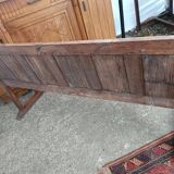 Oak church bench period XVII th century, back decorated with carved parchments