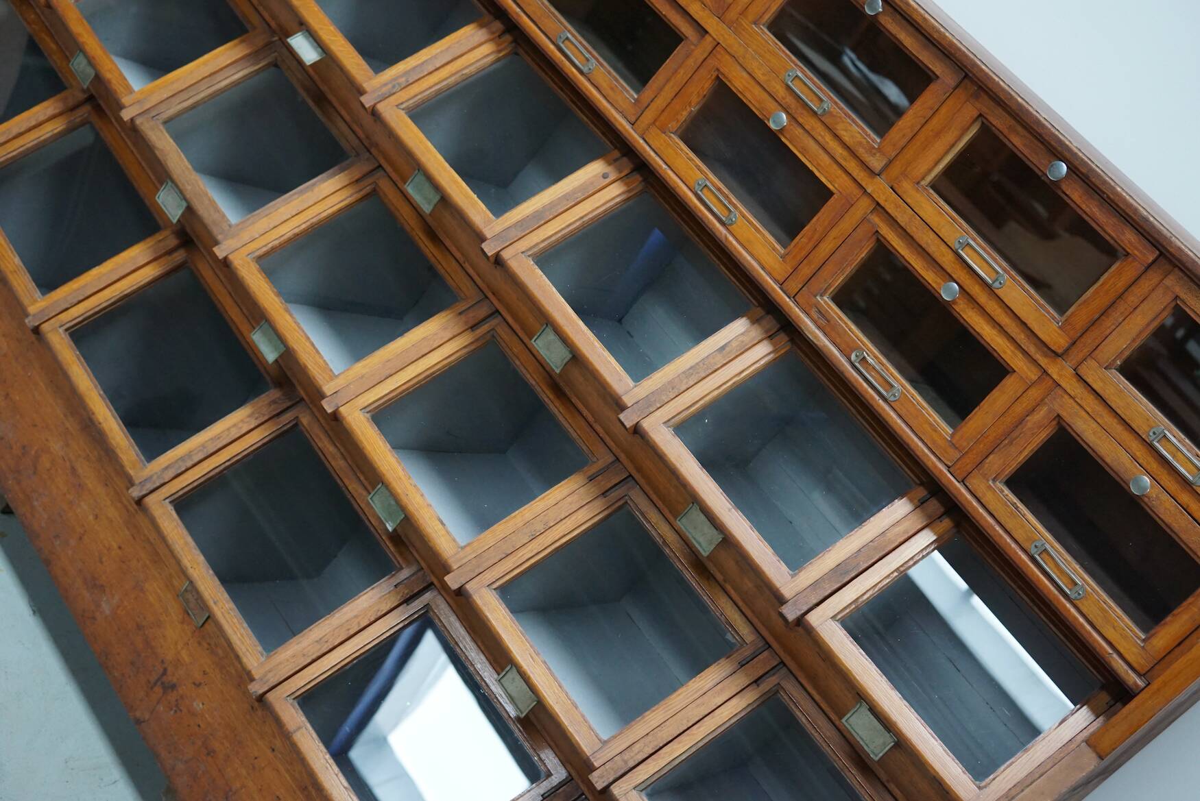 Very large Dutch oak showcase for grocery or haberdashery, 1920s-1930s
