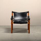 Fauteuil lounge Sirocco Safari d'Arne Norell en palissandre et cuir noir, Suède