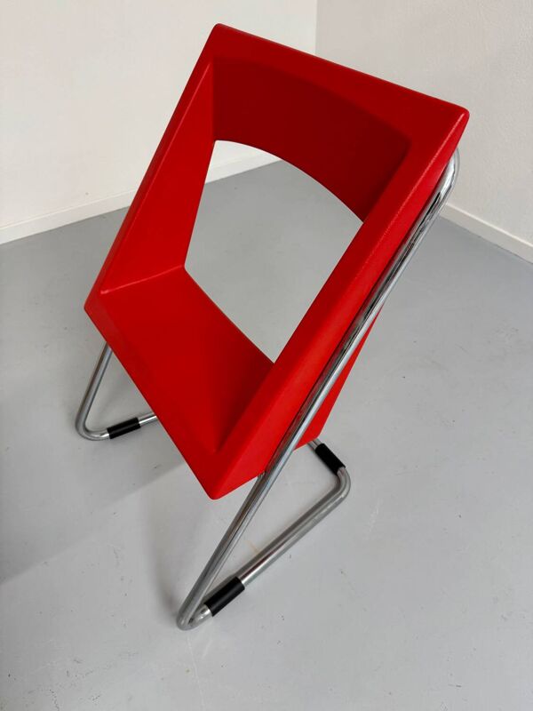 2 chaises tubulaire en simili rouge, années 80 en simili rouge