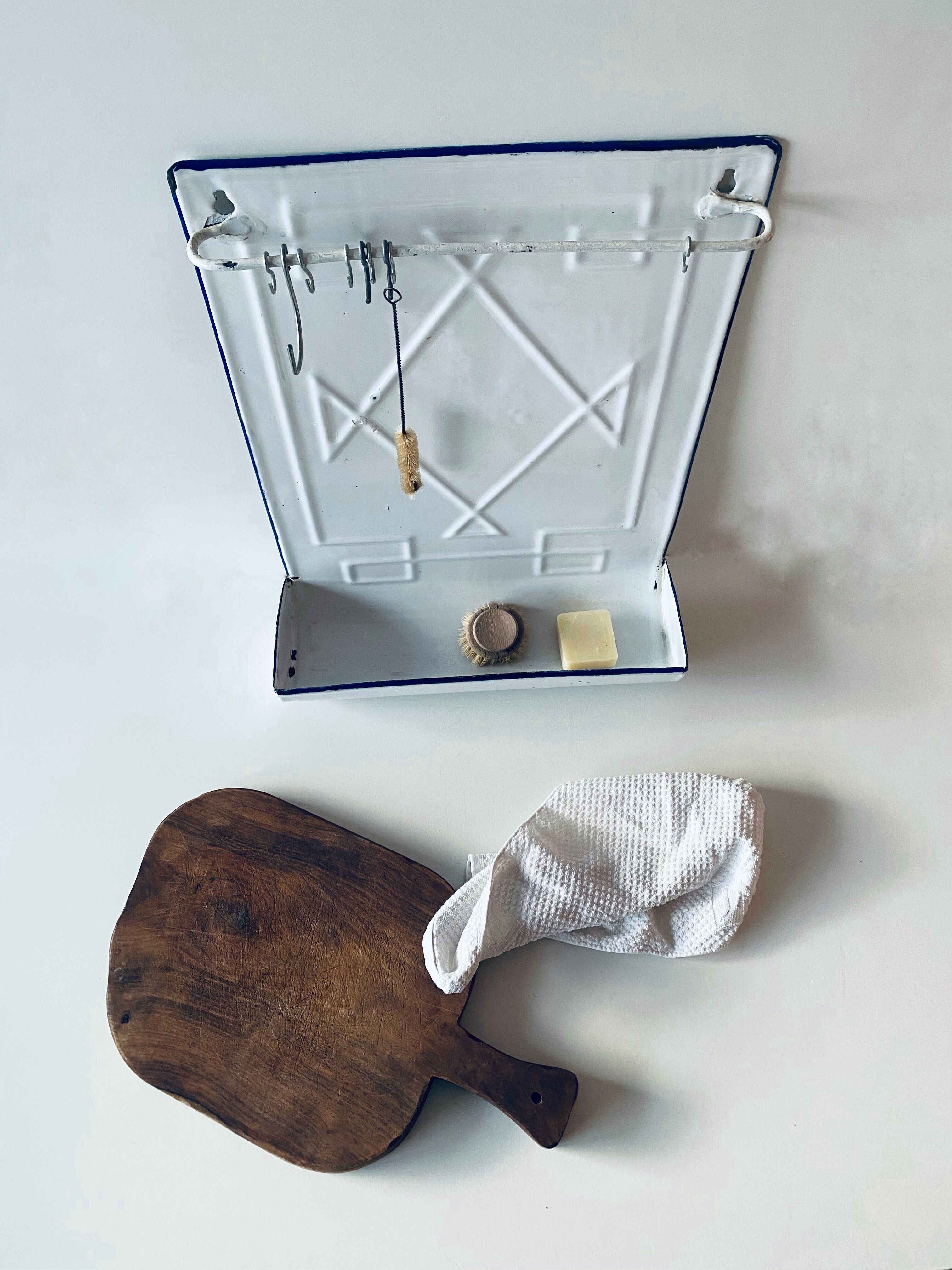 Old enamelled kitchen utensil display