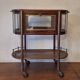 Serving trolley / bar cart in mahogany, brass and glass, 1920