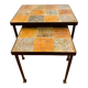 Nest tables in ceramic and metal