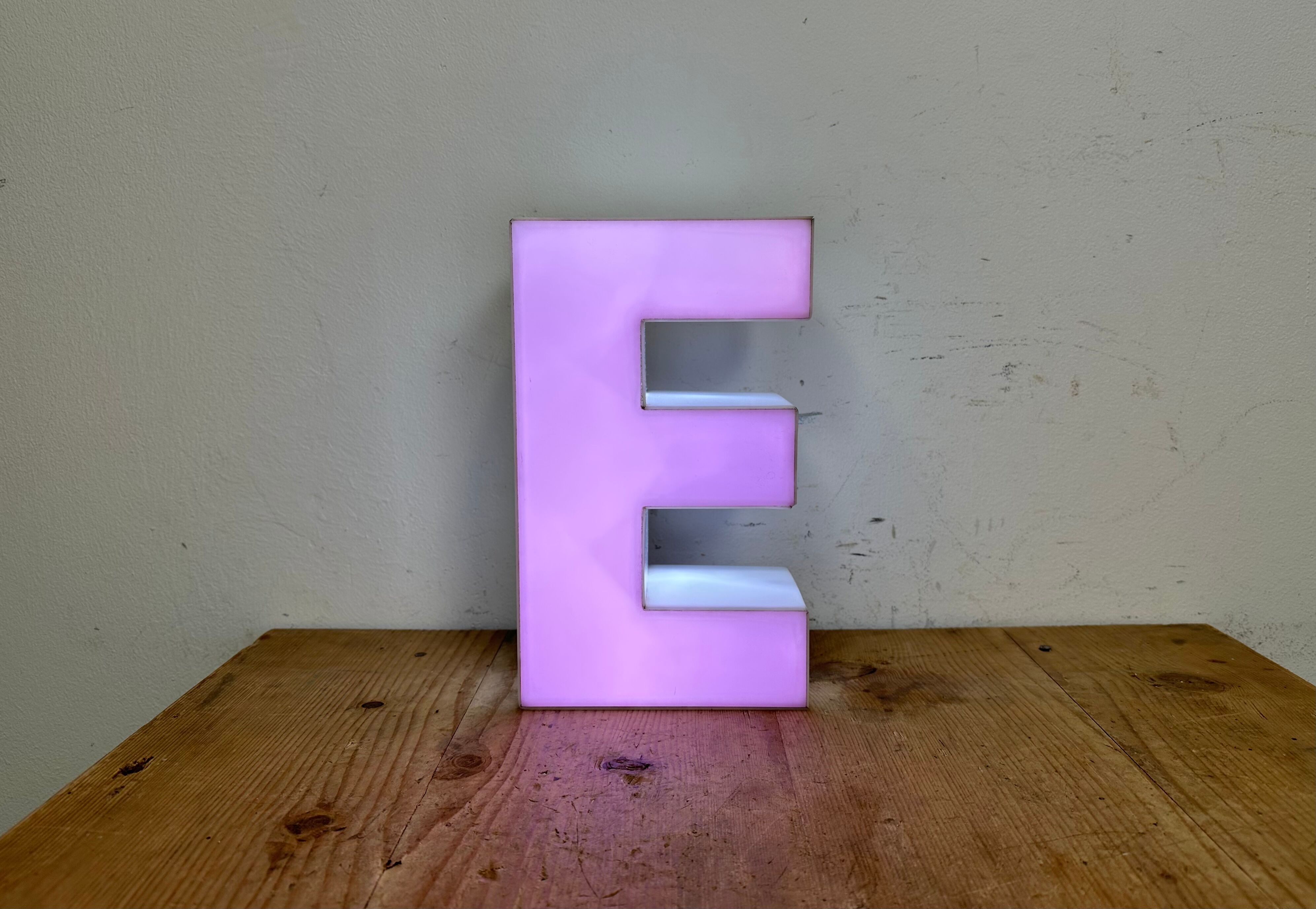 Vintage pink illuminated letter e , 1970s