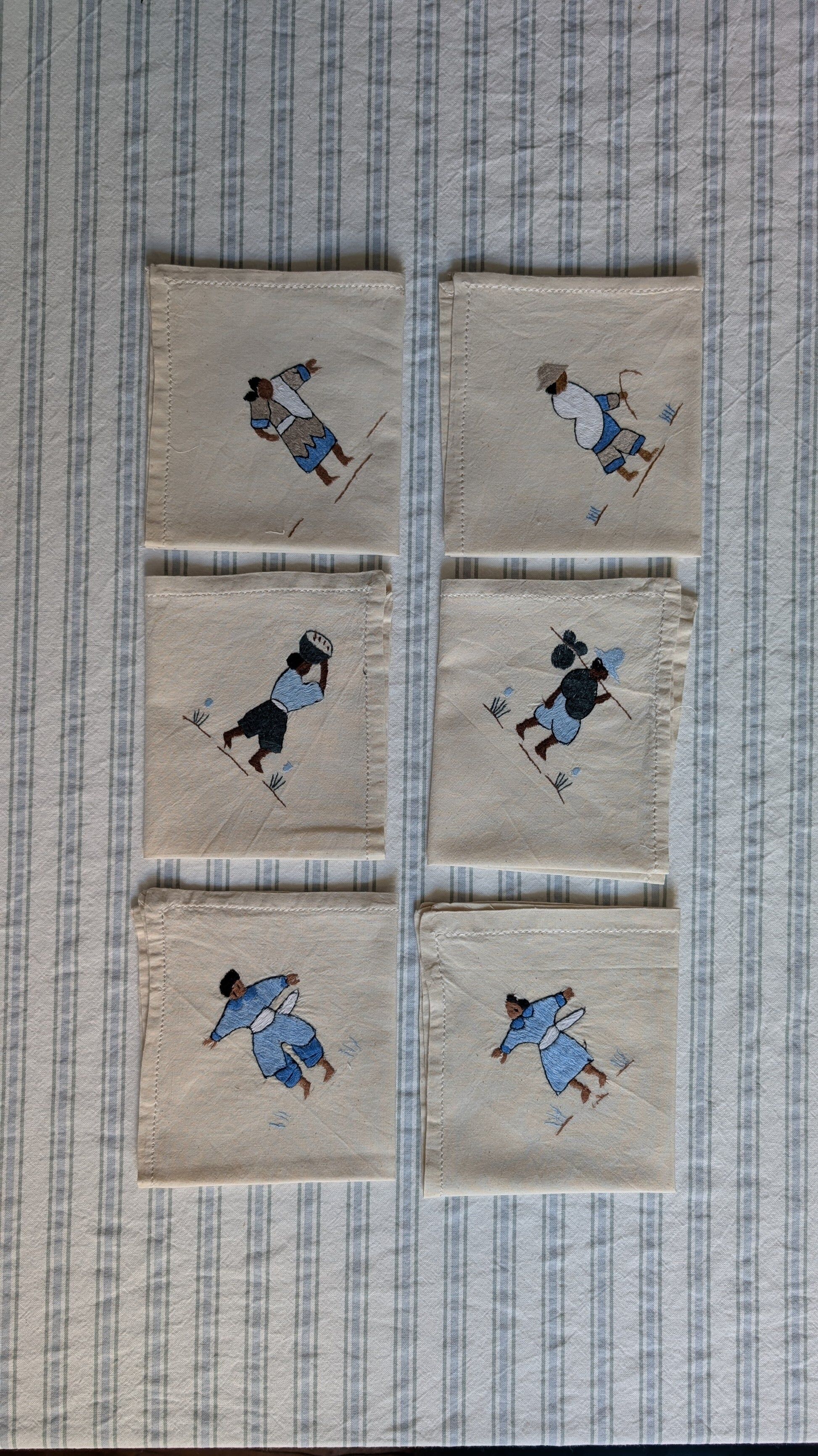Set of 6 embroidered character napkins