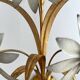 Vintage Hollywood Regency gold metal leaf wall sconce.