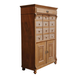 Solid oak dressmaker's cabinet with 13 drawers and 1 door