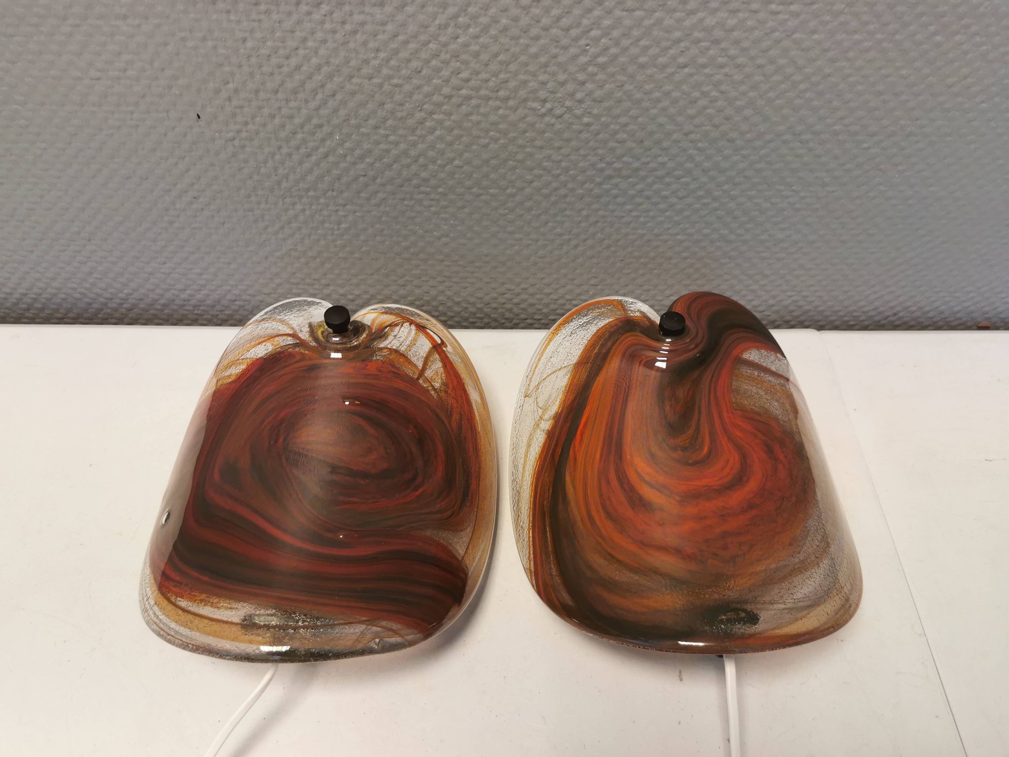 Two wonderfully crafted glass wall lamps designed by per lutken for holmegaard glassworks 1978