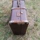 Antique suitcase in leather wood and vintage metal