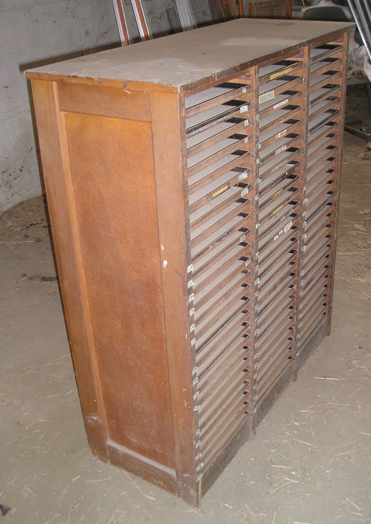 Furniture for printing trades with 75 metal drawers