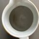Antique teapot in earthenware with a tin filter lid.