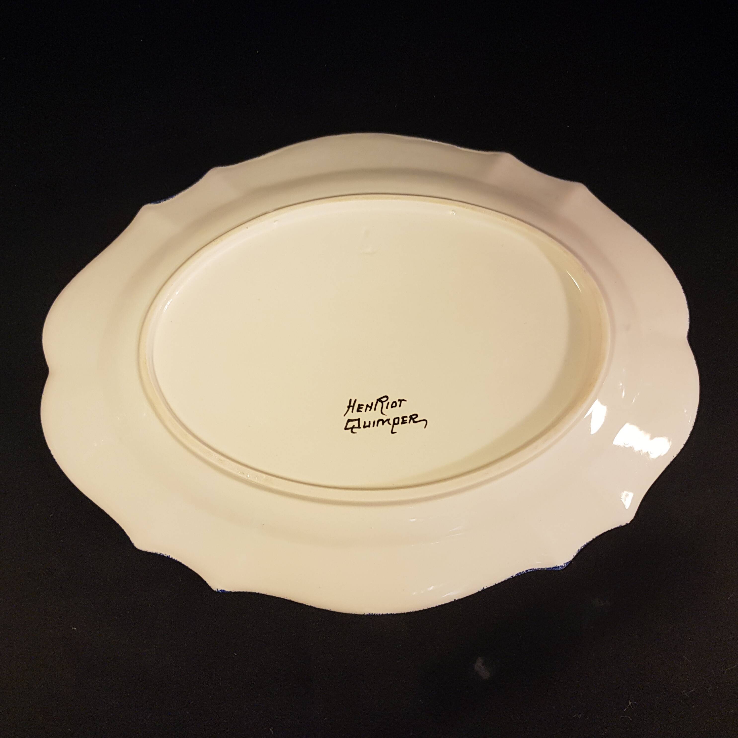 Vegetable soup tureen on Henriot Quimper display dish