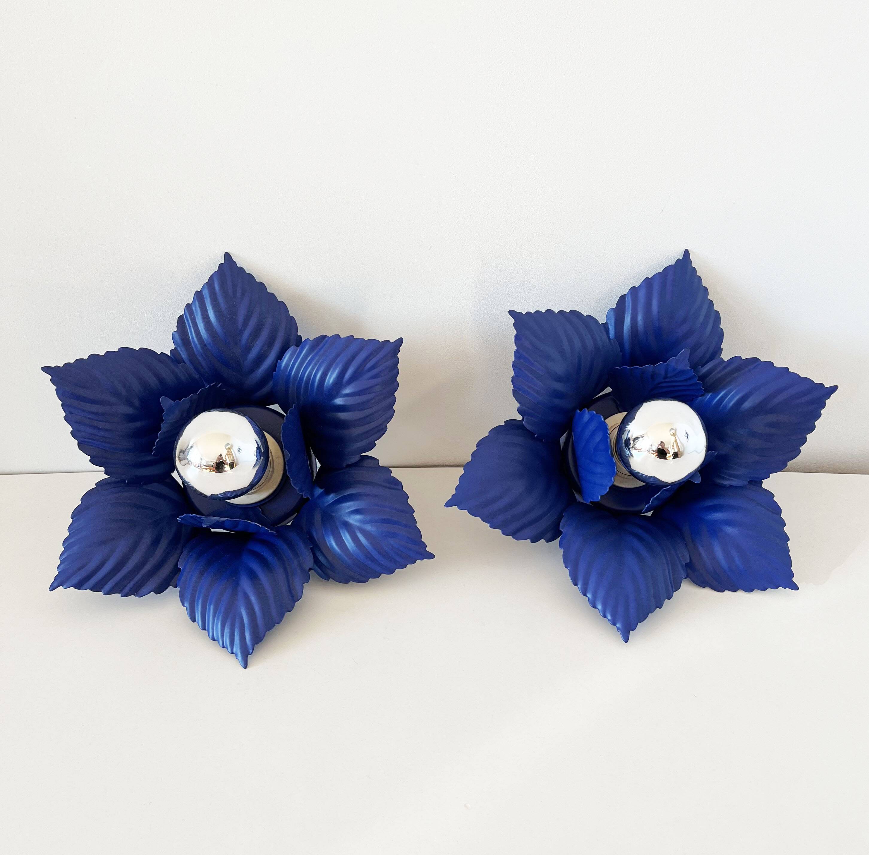 Pair of vintage Masca blue metal flower wall lights