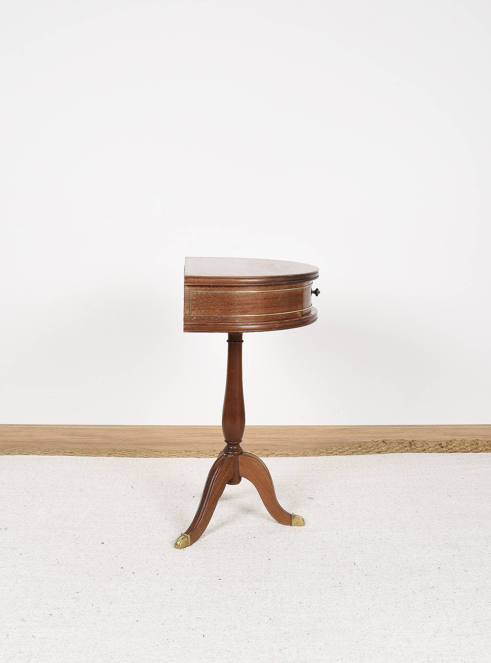 Pedestal table or small side table with drawer.