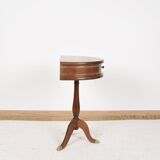 Pedestal table or small side table with drawer.