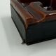 Geometric brown enamelled ashtray with a leather base (1960s-70s)
