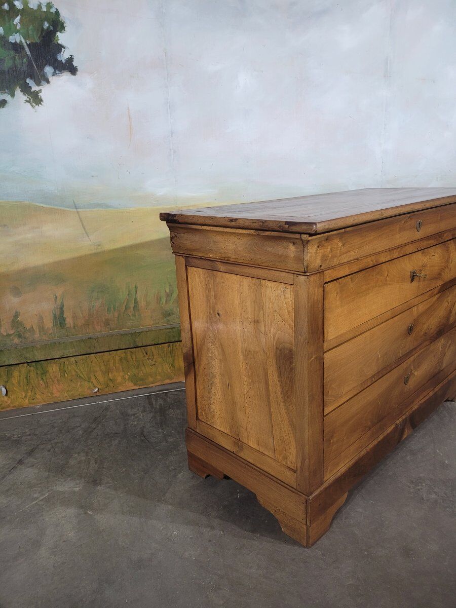 Louis Philippe period chest of drawers in solid walnut.