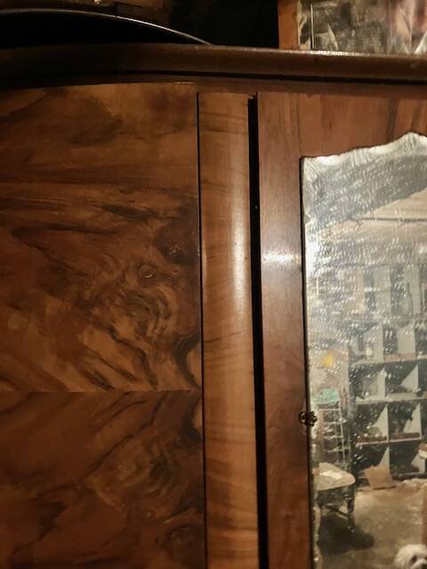 Old black marble chest of drawers