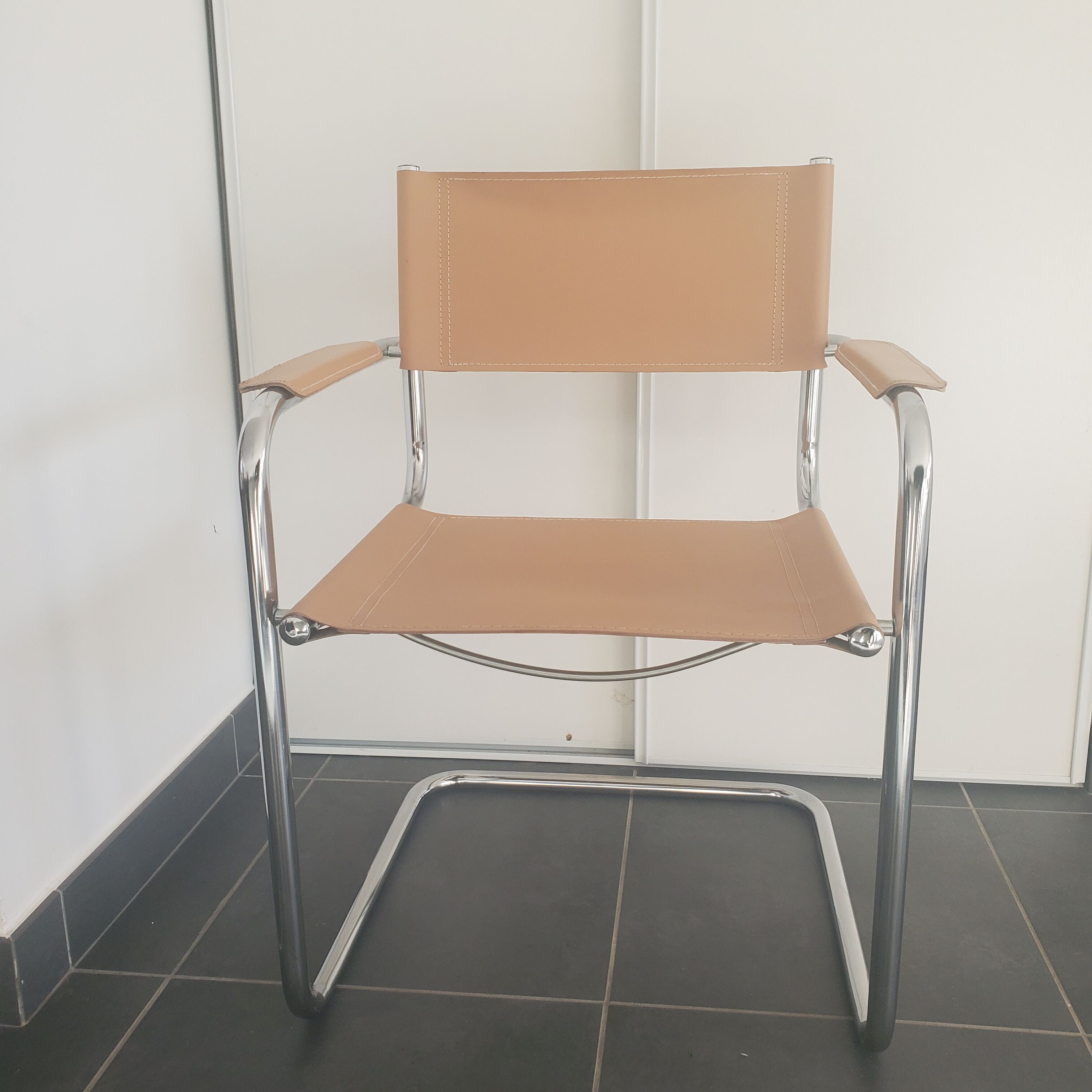 Beige leather armchair