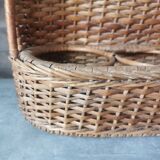 Vintage wicker bottle rack