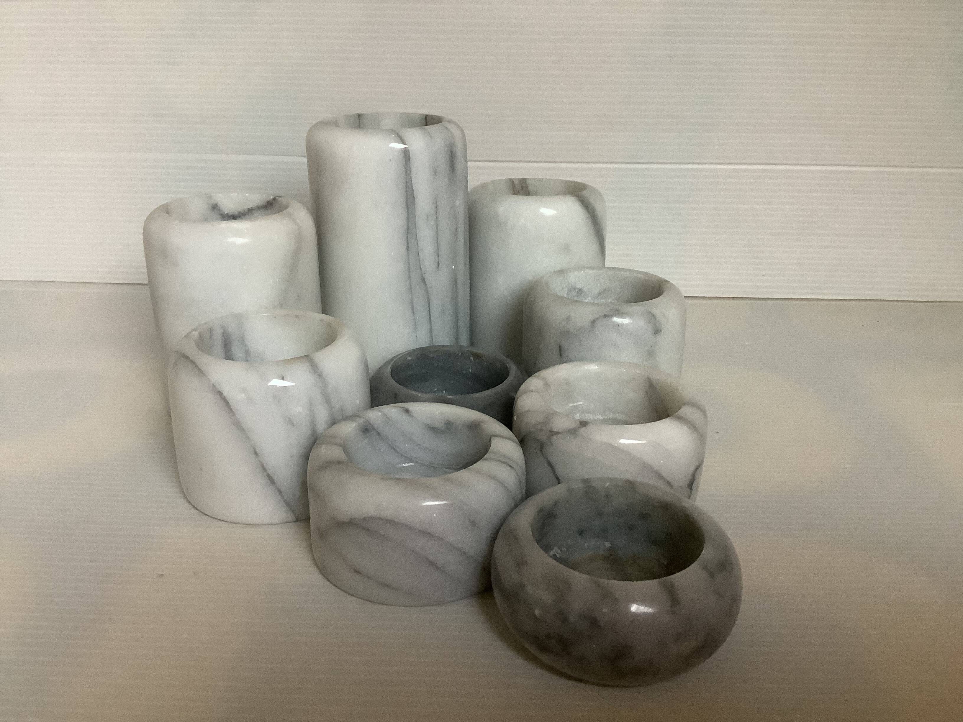 Nine marble candle holders