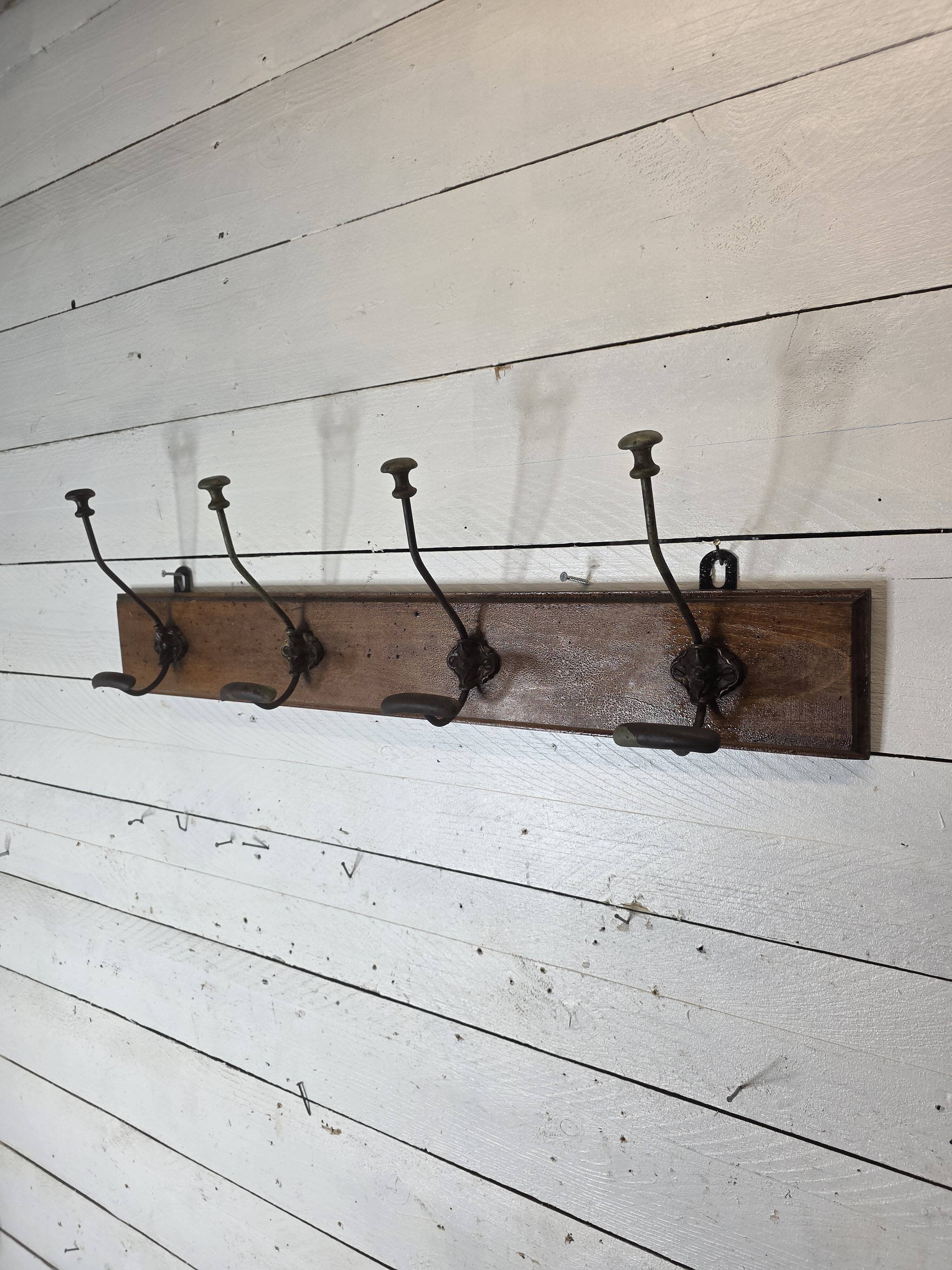 Old coat rack with 4 hooks